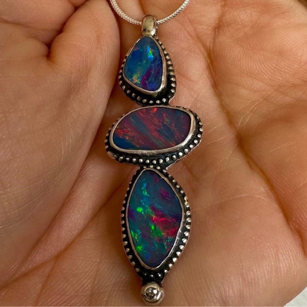 Two opal pendants